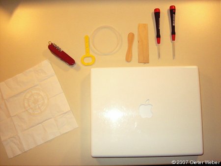 The iBook with disassembly tools
